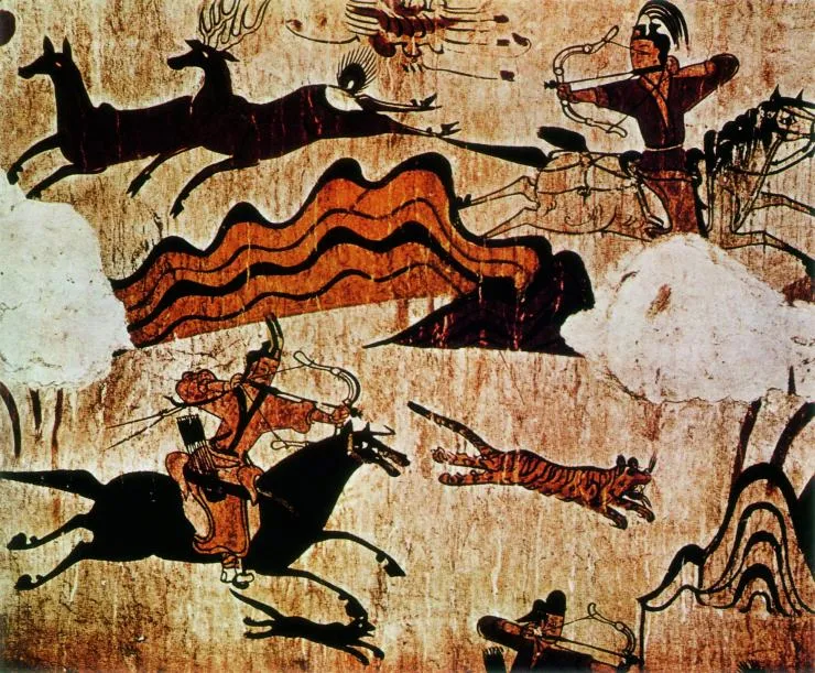 A Goguryeo tomb mural showing figures on horseback hunting deer and tigers with bows