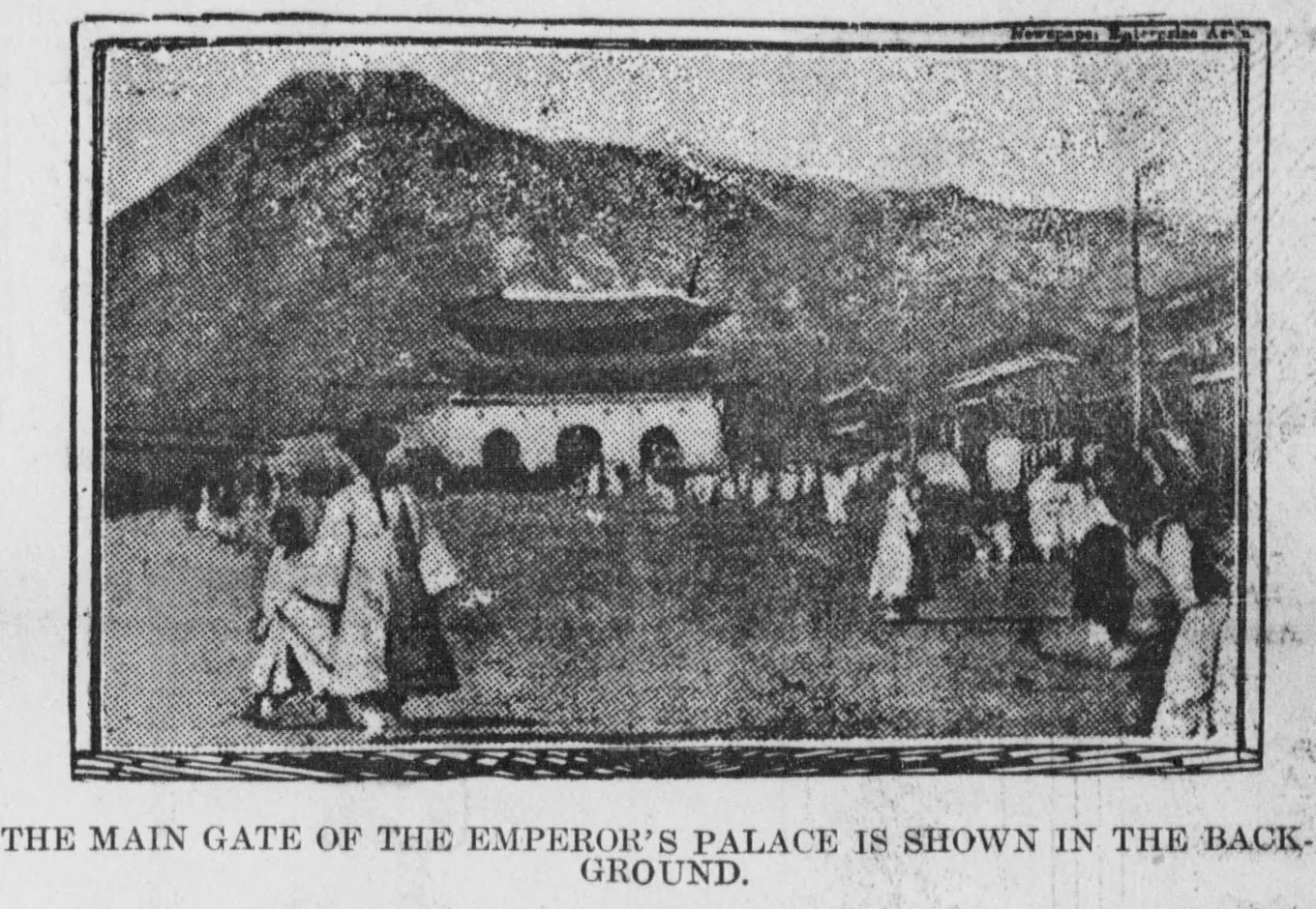 A large traditional Korean palace gate with a tiled roof, photographed in Seoul in 1904